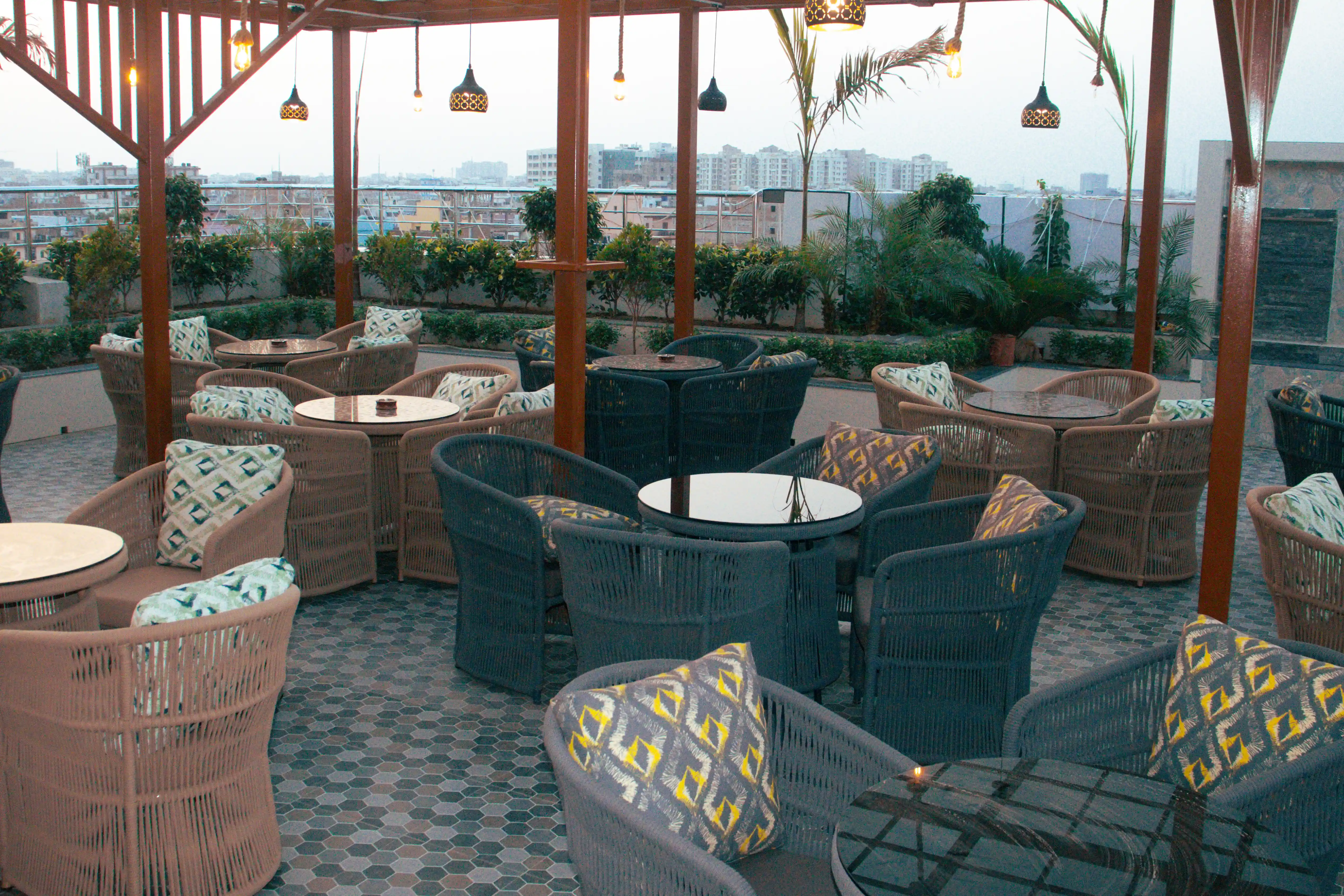 Rooftop cafe area with comfortable seating